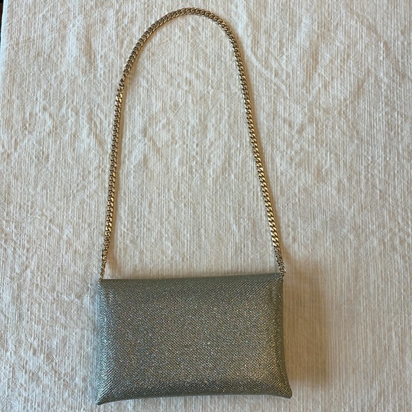 STUART WEITZMAN
The Loveletter Mini Metallic Clutch Bag - Picture 8 of 11